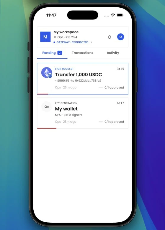 Fystack mobile cosigner app showing a pending USDC sign request and an MPC key generation request awaiting approval
